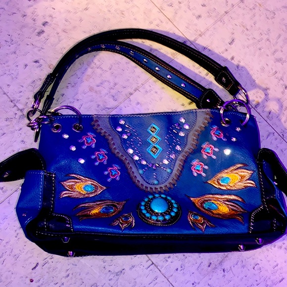 Turquoise leather concealed shoulder bag - Picture 1 of 8